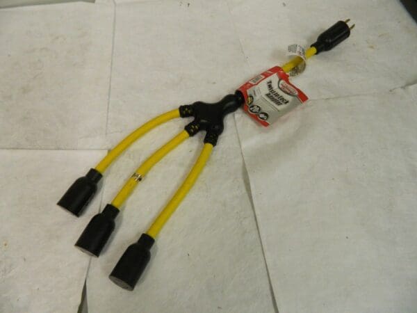 Coleman Cable 125 VAC 20A 3-Outlets Yellow/Black with Adapter 10613586