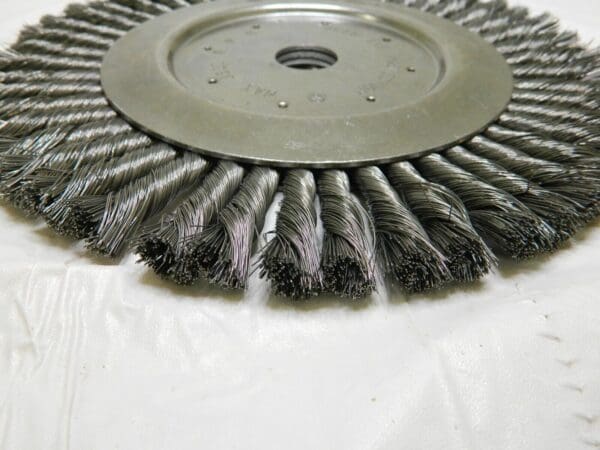 Wheel Brush: 10″ Wheel Dia, Knotted 1″ Hole, Steel, 4,500 RPM 00652081