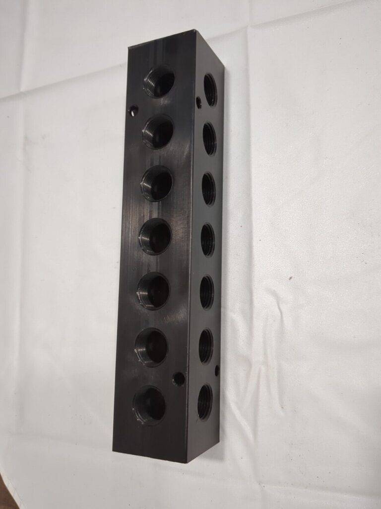 Manifold: 1/2" Inlet, 3/8" Outlet, 2 Inlet Ports, 7 Outlet Ports PCM30-375R-07B