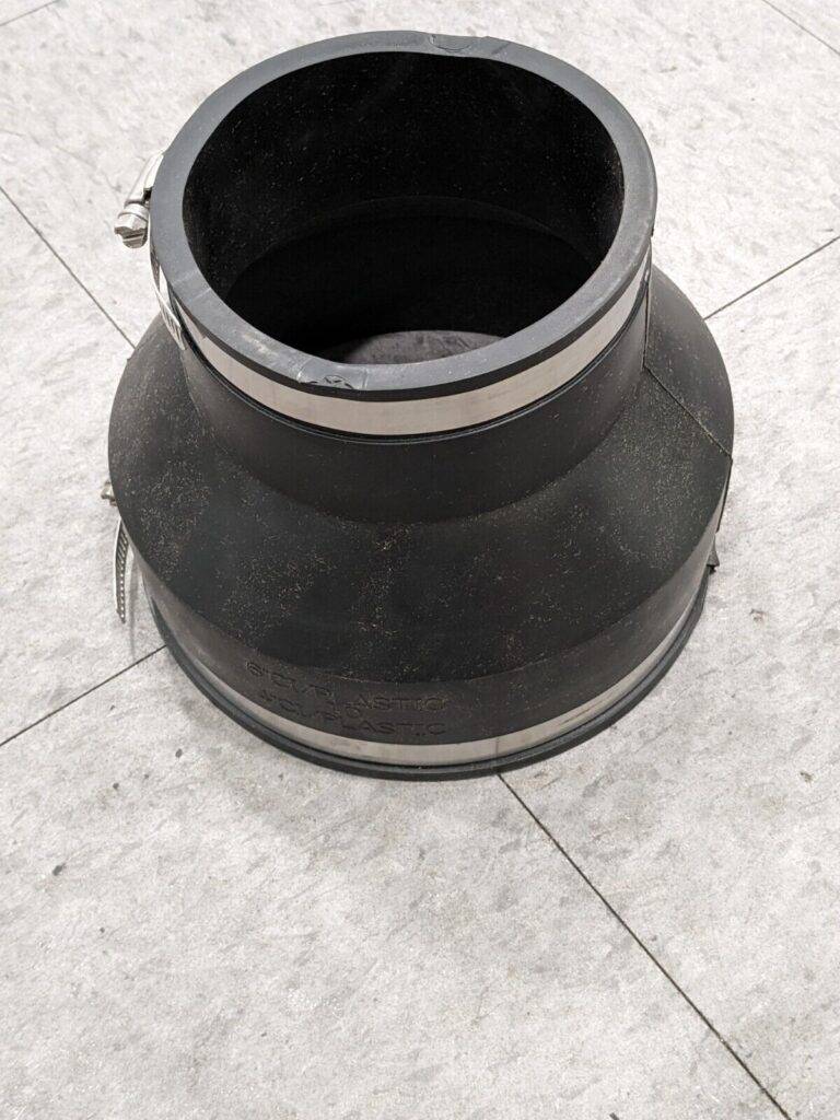FERNCO 6 x 4" PVC Flexible Pipe Coupling with Clamp 1056-64